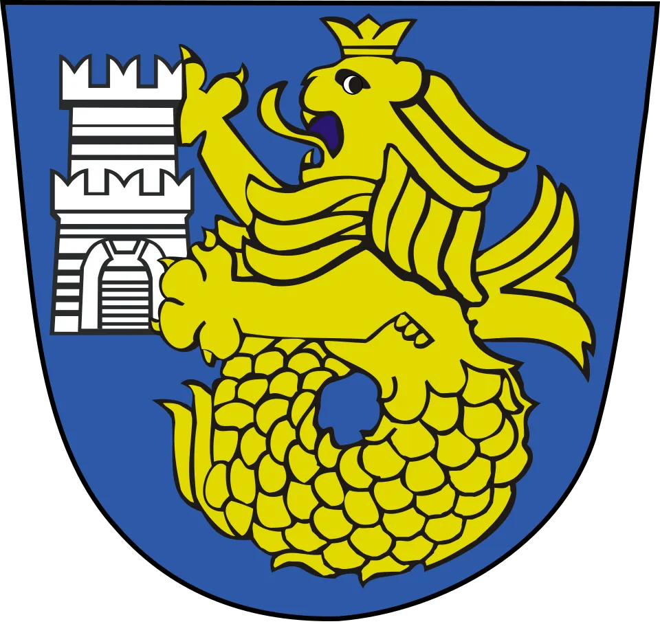 The coat of arms of Burgas: a golden lion with a fish tail beside a white tower, on blue