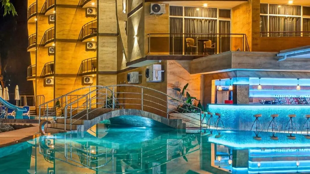 The pool at Boutique Hotel Opal lit at night