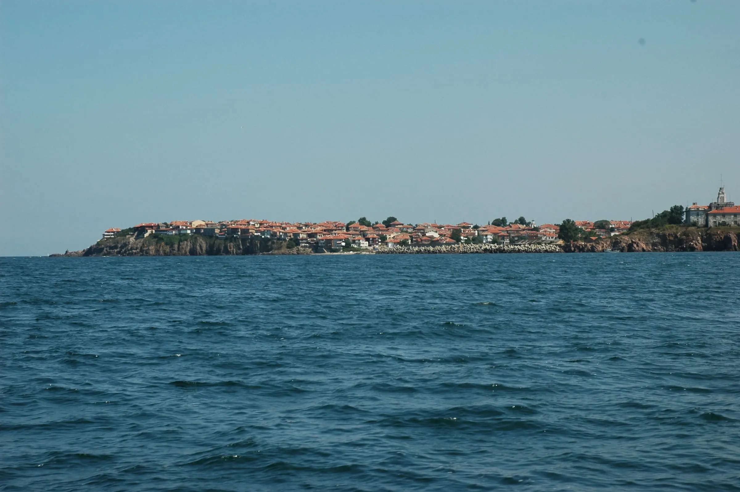 The old town of Sozopol on its low rocky peninsula, seen from the sea