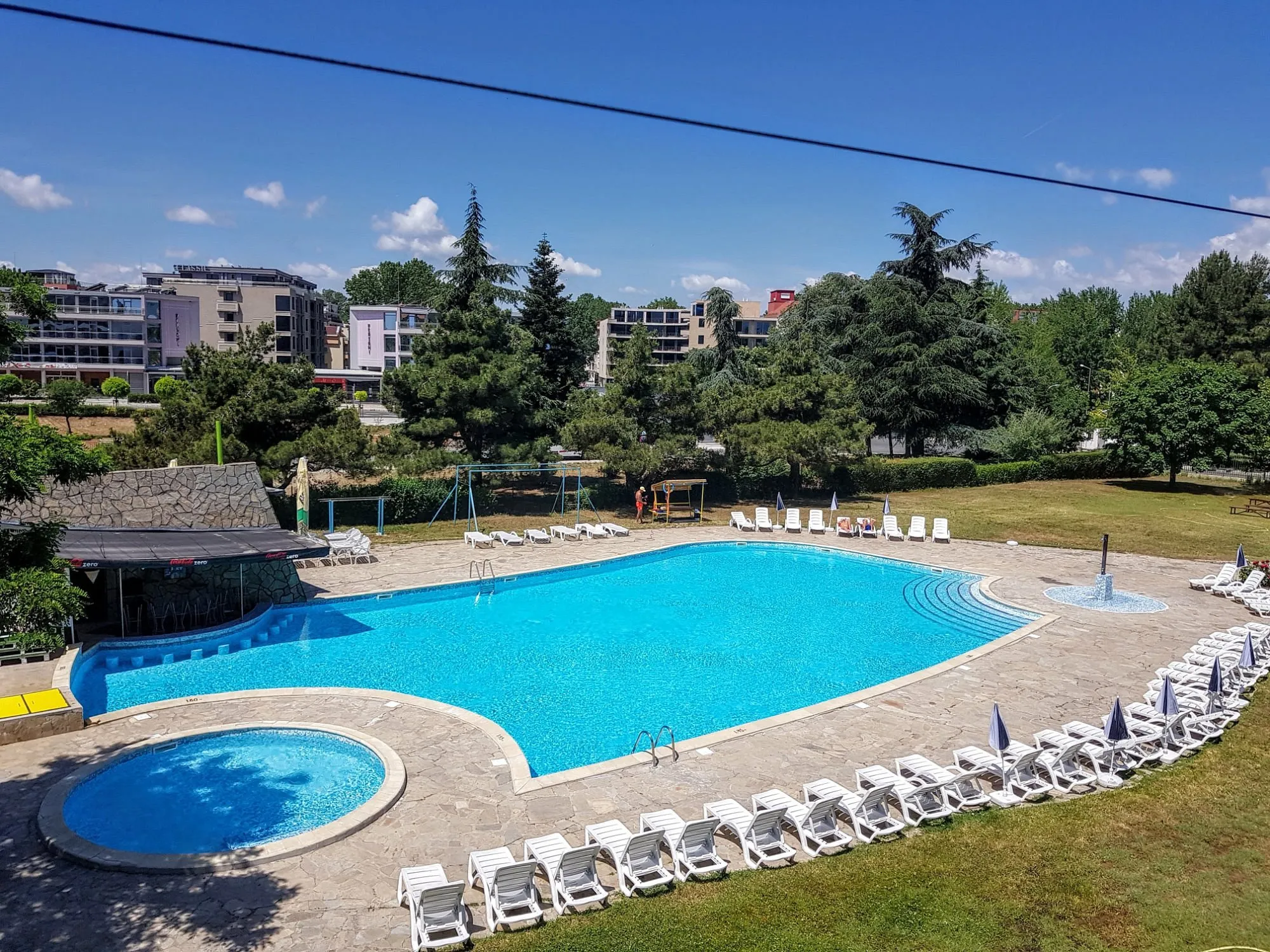 The pool and garden at Sunny Beach Garden Hotel